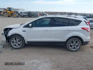 2015 Ford Escape Titanium with VIN 1FMCU9J90FUA67262, listed as a IAAI auction lot 41869583 with 161,281 mi miles. Bid and sale history available at carsss.com. Image 15.