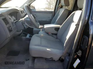 2006 Dodge Dakota SLT with VIN 1D7HW42K46S524262, listed as a Copart auction lot 82985654 with 124,170 mi miles and Salvage Title. Bid and sale history available at DreamBid. Image 7.