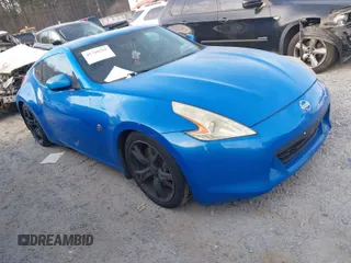 2009 Nissan 370Z Touring with VIN JN1AZ44E39M400201, listed as a IAAI auction lot 41710283 with 245,735 mi miles and . Bid and sale history available at DreamBid. Image 1.