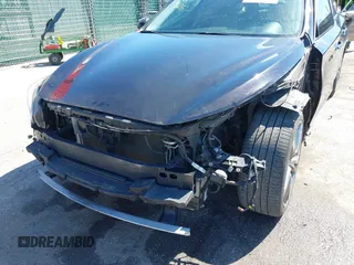 2015 Infiniti Q50 Premium z VIN JN1BV7AR2FM416586, wystawiony jako IAAI lot #41728760 z przebiegiem 138 446 mil mil oraz . Historia ofert i sprzedaży dostępna na DreamBid. Obrazek 6.