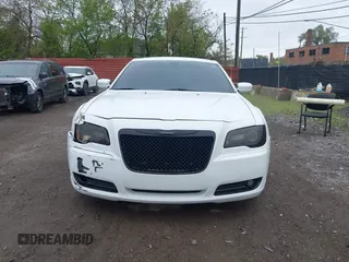 2014 Chrysler 300 S with VIN 2C3CCABG9EH355602, listed as a IAAI auction lot 42244756 with 165,816 mi miles and . Bid and sale history available at DreamBid. Image 12.