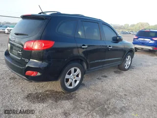 2009 Hyundai Santa Fe SE with VIN 5NMSH13E69H325943, listed as a IAAI auction lot 41813153 with 176,514 mi miles. Bid and sale history available at carsss.com. Image 4.