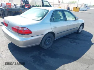 1999 Honda Accord LX with VIN JHMCG6650XC011621, listed as a IAAI auction lot 42401527 with 243,227 mi miles and . Bid and sale history available at DreamBid. Image 4.