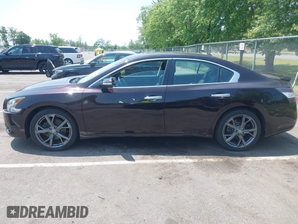 2014 Nissan Maxima SV z VIN 1N4AA5AP7EC486859, wystawiony jako IAAI lot #42420335 z przebiegiem 71 283 mil mil oraz . Historia ofert i sprzedaży dostępna na DreamBid. Obrazek 12.
