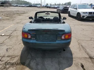 2000 Mazda MX-5 Miata with VIN JM1NB3533Y0151883, listed as a Copart auction lot 64423925 with 180,275 mi miles and Salvage title. Bid and sale history available at DreamBid. Image 6.