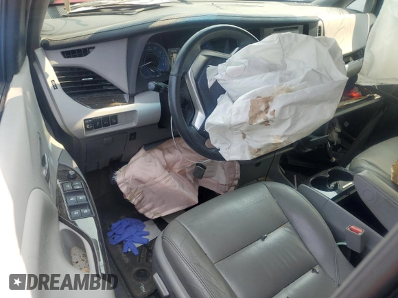 2017 Toyota Sienna XLE with VIN 5TDDZ3DC6HS186360, listed as a Copart auction lot 57504965 with 99,026 mi miles and Salvage title. Bid and sale history available at DreamBid. Image 8.