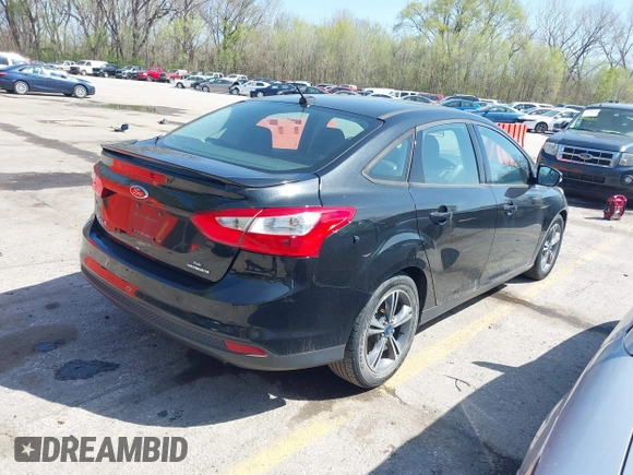 2014 Ford Focus SE with VIN 1FADP3F26EL223601, listed as a IAAI auction lot 41930554 with 190,275 mi miles. Bid and sale history available at carsss.com. Image 4.