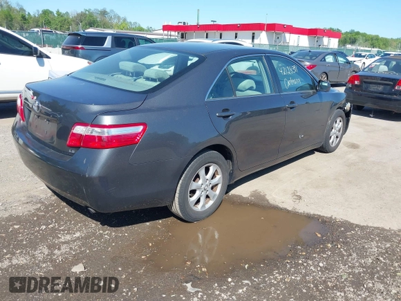 2007 Toyota Camry CE with VIN 4T1BE46K07U638516, listed as a IAAI auction lot 42128391 with 168,649 mi miles. Bid and sale history available at carsss.com. Image 4.
