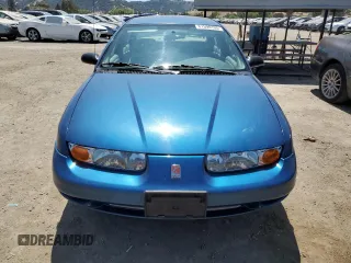 2000 Saturn SL with VIN 1G8ZK5271YZ184701, listed as a Copart auction lot 61598135 with 123,309 mi miles and Salvage title. Bid and sale history available at DreamBid. Image 5.