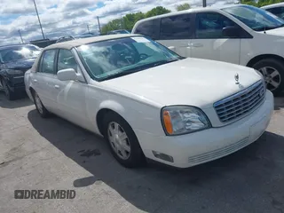 2003 Cadillac DeVille z VIN 1G6KD54Y23U221187, wystawiony jako IAAI lot #42339315 z przebiegiem 82 681 mil mil oraz . Historia ofert i sprzedaży dostępna na DreamBid. Obrazek 1.