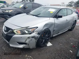 2017 Nissan Maxima SR with VIN 1N4AA6AP2HC396545, listed as a IAAI auction lot 41910588 with 142,661 mi miles and . Bid and sale history available at DreamBid. Image 2.