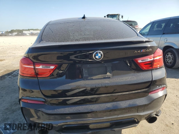 2017 BMW X4 M40i with VIN 5UXXW7C57H0U25271, listed as a Copart auction lot 52867584 with 92,502 mi miles. Bid and sale history available at carsss.com. Image 6.