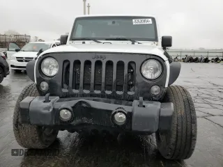 2018 Jeep Wrangler JK Unlimited Sport S with VIN 1C4BJWDG3JL889960, listed as a Copart auction lot 82630904 with 125,427 mi miles and Clean Title. Bid and sale history available at carsss.com. Image 5.