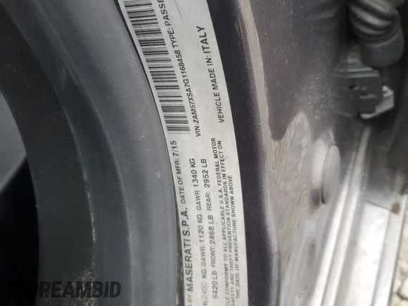 2016 Maserati Ghibli z VIN ZAM57XSA7G1168458, wystawiony jako Copart lot #43611465 z przebiegiem 98 110 mil mil oraz Szkody całkowita. Historia ofert i sprzedaży dostępna na DreamBid. Obrazek 12.