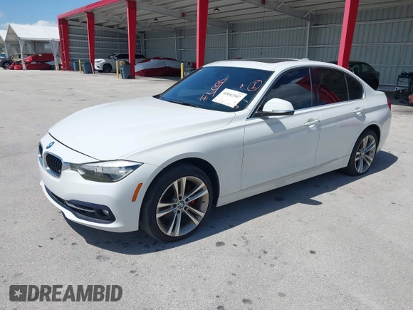 2018 BMW 3 Series 330i with VIN WBA8B9G52JNU57283, listed as a IAAI auction lot 42042507 with 51,740 mi miles and . Bid and sale history available at DreamBid. Image 2.