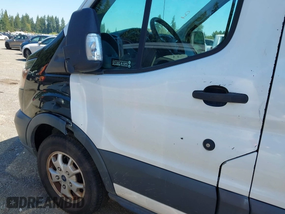 2015 Ford Transit Cargo z VIN 1FTYR2CM4FKA84548, wystawiony jako IAAI lot #42561069 z przebiegiem 174 469 mil mil oraz . Historia ofert i sprzedaży dostępna na DreamBid. Obrazek 6.