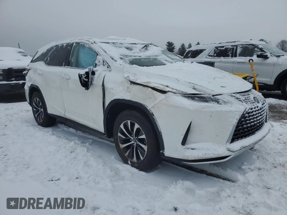 2021 Lexus RX with VIN JTJHZKFA6M2034049, listed as a Copart auction lot 44981475 with 56,053 mi miles and Salvage Title. Bid and sale history available at carsss.com. Image 4.