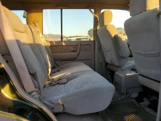 2002 Isuzu Trooper S with VIN JACDJ58X427J08532, listed as a Copart auction lot 84227494 with 166,636 mi miles and Salvage title. Bid and sale history available at DreamBid. Image 11.