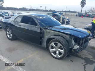 2014 Dodge Challenger R/T z VIN 2C3CDYBT3EH185532, wystawiony jako IAAI lot #42259523 z przebiegiem 169 178 mil mil oraz . Historia ofert i sprzedaży dostępna na DreamBid. Obrazek 1.