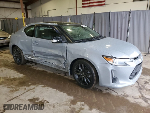 2014 Scion tC z VIN JTKJF5C7XE3071780, wystawiony jako Copart lot #47220975 z przebiegiem 102 630 mil mil oraz Szkody całkowita. Historia ofert i sprzedaży dostępna na DreamBid. Obrazek 4.