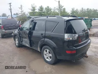 2007 Mitsubishi Outlander LS z VIN JA4MT31X37Z011404, wystawiony jako IAAI lot #42002468 z przebiegiem 154 798 mil mil oraz . Historia ofert i sprzedaży dostępna na DreamBid. Obrazek 3.