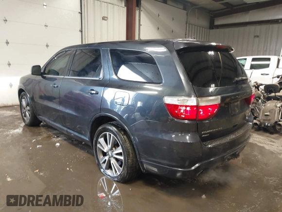 2013 Dodge Durango R/T z VIN 1C4SDJCT2DC662269, wystawiony jako IAAI lot #41602661 z przebiegiem 180 014 mil mil oraz . Historia ofert i sprzedaży dostępna na DreamBid. Obrazek 3.