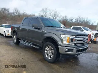 2019 Ford F-150 XL with VIN 1FTEW1E41KKF22472, listed as a IAAI auction lot 41493985 with 113,736 mi miles. Bid and sale history available at carsss.com. Image 1.