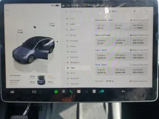 2023 Tesla Model Y Long Range with VIN 7SAYGDEE2PA024693, listed as a Copart auction lot 52595935 with 35,179 mi miles and Salvage Title. Bid and sale history available at DreamBid. Image 9.