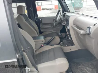 2007 Jeep Wrangler X with VIN 1J4FA24187L179428, listed as a IAAI auction lot 42492457 with 148,208 mi miles and . Bid and sale history available at DreamBid. Image 5.