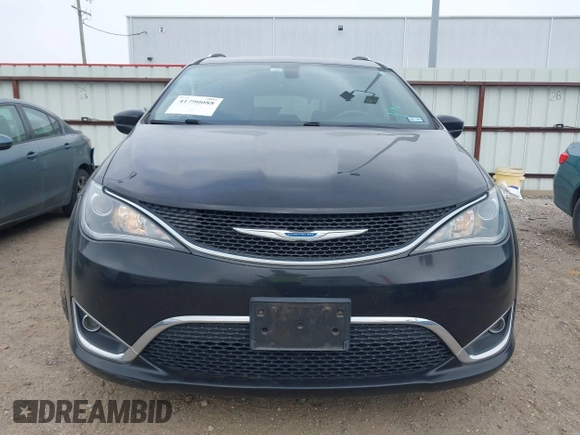 2018 Chrysler Pacifica Touring L Plus z VIN 2C4RC1EG7JR158093, wystawiony jako IAAI lot #41790088 z przebiegiem 116 772 mil mil oraz . Historia ofert i sprzedaży dostępna na DreamBid. Obrazek 13.