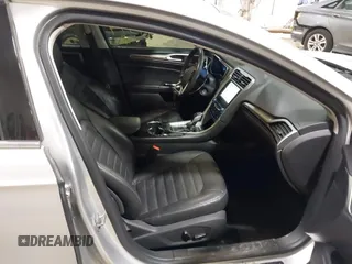 2014 Ford Fusion SE Hybrid with VIN 3FA6P0LU8ER183231, listed as a IAAI auction lot 41848377 with 130,496 mi miles. Bid and sale history available at carsss.com. Image 5.