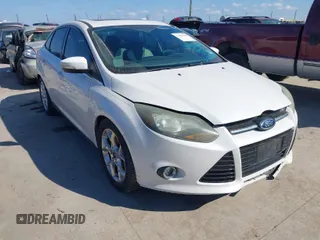 2014 Ford Focus Titanium with VIN 1FADP3J21EL349100, listed as a IAAI auction lot 41483686 with 128,797 mi miles. Bid and sale history available at carsss.com. Image 1.
