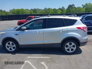 2013 Ford Escape SE with VIN 1FMCU0GX0DUA19811, listed as a IAAI auction lot 42009015 with 135,662 mi miles. Bid and sale history available at carsss.com. Image 14.