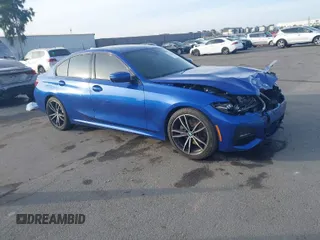 2019 BMW 3 Series 330i xDrive with VIN WBA5R7C50KAE82705, listed as a IAAI auction lot 41233898 with 69,505 mi miles. Bid and sale history available at carsss.com. Image 1.
