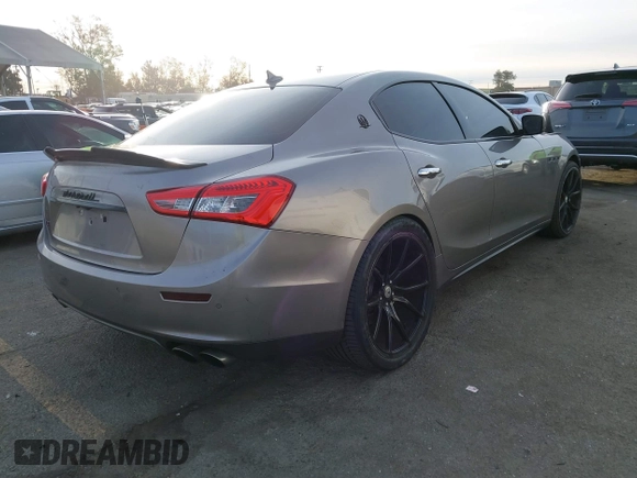 2015 Maserati Ghibli S Q4 z VIN ZAM57RTA8F1144095, wystawiony jako IAAI lot #41392848 z przebiegiem 52 237 mil mil oraz . Historia ofert i sprzedaży dostępna na DreamBid. Obrazek 4.