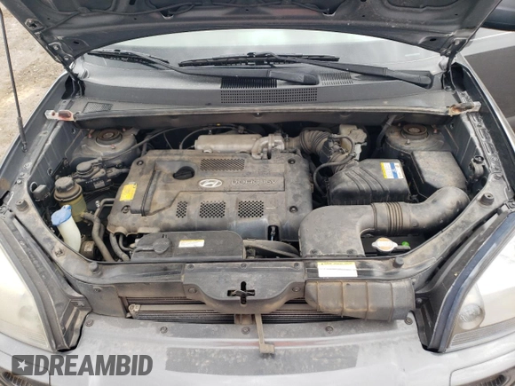 2007 Hyundai Tucson GLS with VIN KM8JM12B27U614351, listed as a Copart auction lot 69491404 with 127,278 mi miles and Salvage Title. Bid and sale history available at carsss.com. Image 13.