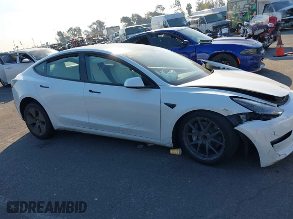 2022 Tesla Model 3 with VIN 5YJ3E1EA4NF319237, listed as a IAAI auction lot 41263761 with 44,384 mi miles and . Bid and sale history available at DreamBid. Image 13.