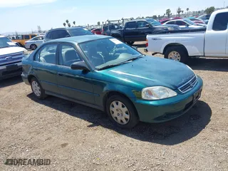 1999 Honda Civic VP with VIN 2HGEJ6611XH540017, listed as a IAAI auction lot 42093222 with 154,261 mi miles. Bid and sale history available at carsss.com. Image 1.