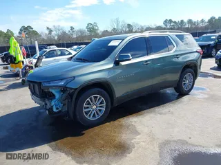 2022 Chevrolet Traverse LT Leather with VIN 1GNEVHKWXNJ141805, listed as a IAAI auction lot 41641352 with 71,504 mi miles. Bid and sale history available at carsss.com. Image 2.