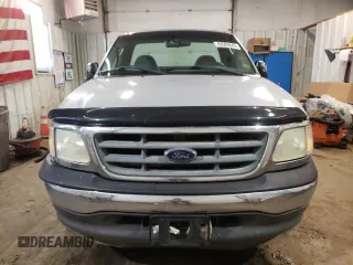 2002 Ford F-150 XL z VIN 1FTRF17W92NB99531, wystawiony jako Copart lot #49585545 z przebiegiem 148 167 mil mil oraz Szkoda całkowita • Salvage title. Historia ofert i sprzedaży dostępna na DreamBid. Obrazek 5.