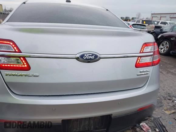 2016 Ford Taurus SEL with VIN 1FAHP2E83GG148711, listed as a IAAI auction lot 41206630 with 115,816 mi miles and . Bid and sale history available at DreamBid. Image 16.