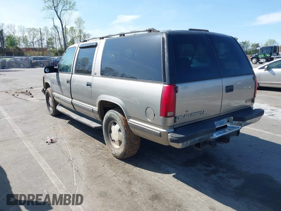 1999 GMC Suburban with VIN 3GKFK16R4XG514928, listed as a IAAI auction lot 41934636 with 245,010 mi miles and . Bid and sale history available at DreamBid. Image 3.