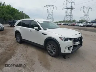 2024 Mazda CX-90 Select z VIN JM3KKAHD6R1166568, wystawiony jako IAAI lot #42341133 z przebiegiem 9 812 mil mil oraz . Historia ofert i sprzedaży dostępna na DreamBid. Obrazek 1.