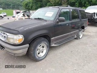 1996 Ford Explorer XL with VIN 1FMDU34X7TZB67613, listed as a IAAI auction lot 42513644 with 169,502 mi miles and . Bid and sale history available at DreamBid. Image 2.