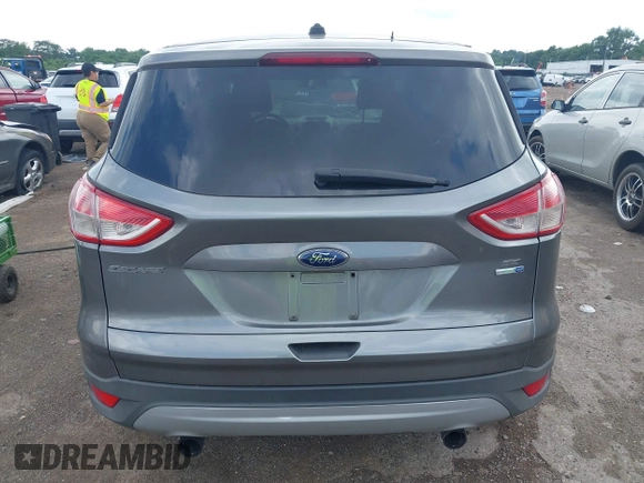 2013 Ford Escape SE with VIN 1FMCU9G95DUC01185, listed as a IAAI auction lot 42602840 with 140,697 mi miles and . Bid and sale history available at DreamBid. Image 16.