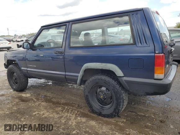 1997 Jeep Cherokee SE with VIN 1J4FT27P0VL612859, listed as a Copart auction lot 49869915 with 198,702 mi miles and Salvage title. Bid and sale history available at DreamBid. Image 2.