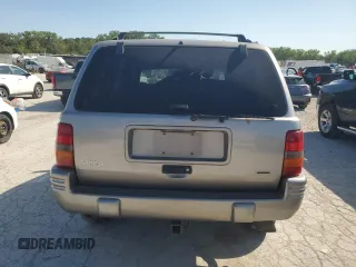 1998 Jeep Grand Cherokee Limited with VIN 1J4GZ78S5WC325148, listed as a Copart auction lot 67780424 with 0 mi miles and Salvage Title. Bid and sale history available at carsss.com. Image 6.