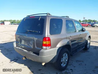 2002 Ford Escape XLT Choice with VIN 1FMYU04172KC92145, listed as a IAAI auction lot 42081862 with 225,812 mi miles. Bid and sale history available at carsss.com. Image 4.