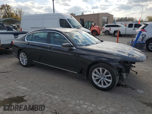 2018 BMW 7 Series 740i xDrive with VIN WBA7E4C54JGV23901, listed as a Copart auction lot 77322824 with 70,922 mi miles and Salvage Title. Bid and sale history available at carsss.com. Image 4.