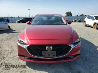 2022 Mazda 3 Carbon Edition z VIN JM1BPACL2N1506916, wystawiony jako Copart lot #54924185 z przebiegiem 71 622 mil mil oraz Szkoda całkowita • Salvage title. Historia ofert i sprzedaży dostępna na DreamBid. Obrazek 5.